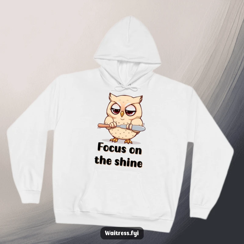 Funny Kawaii owl hoodie featuring a determined owl polishing silverware with focused eyes, cozy and stylish.