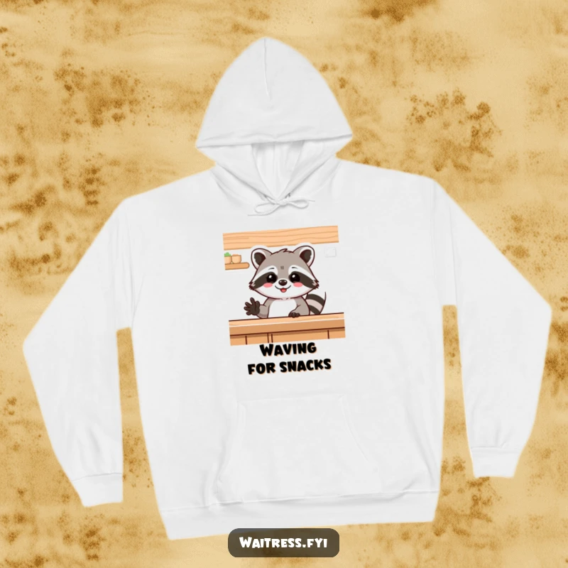 Funny raccoon hoodie, a delighted raccoon waving from behind a counter, offering a friendly hello. Cozy and humorous apparel.